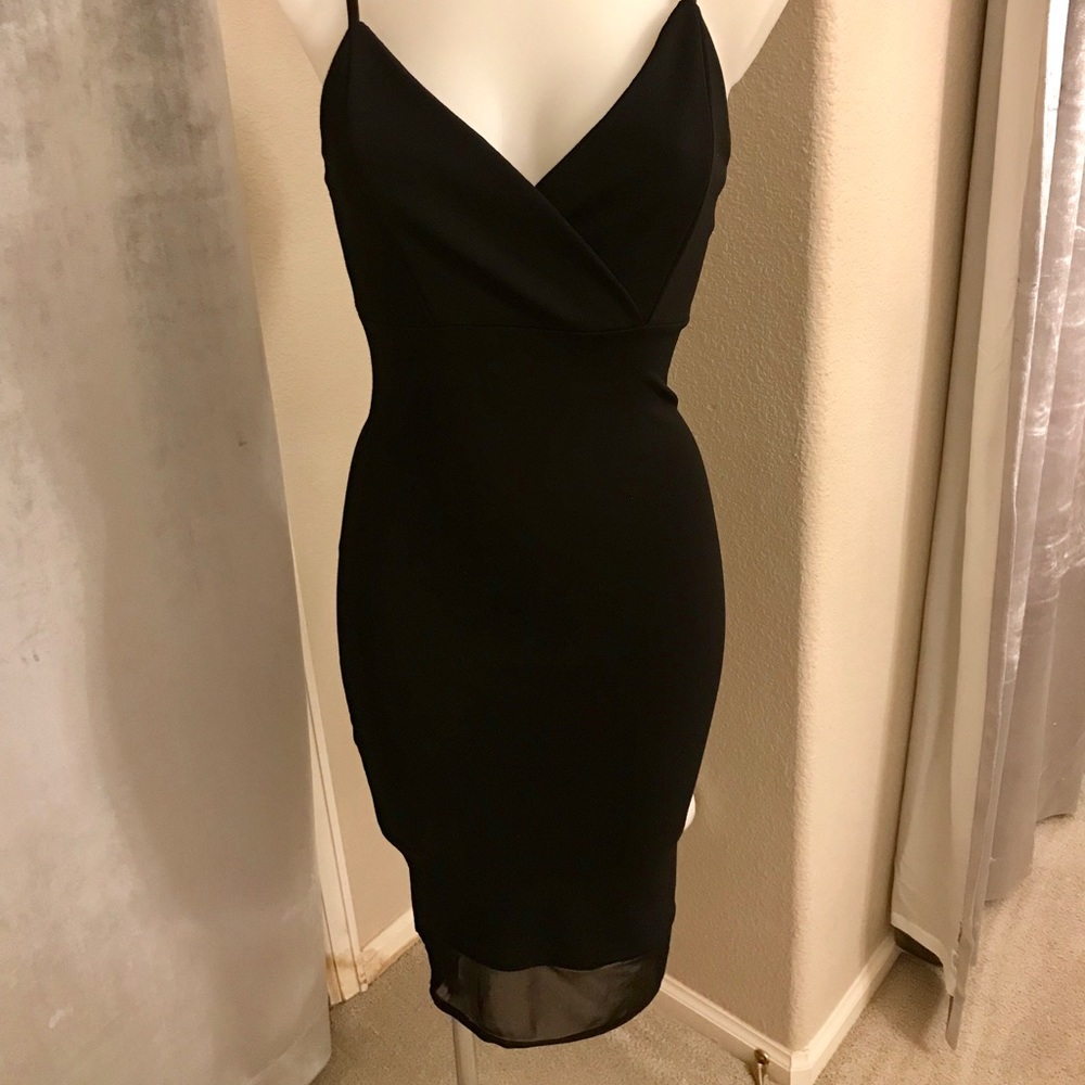 Black midi dress with sheer hem